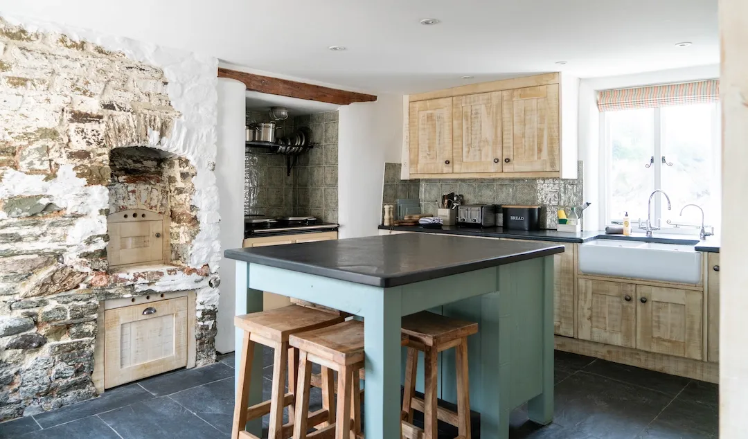 The Mill House kitchen with stable doors and original bread oven